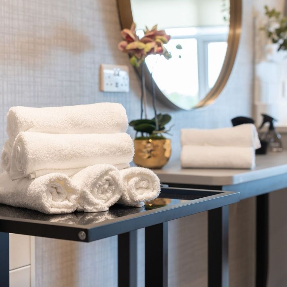 Luxury spa towels in wellbeing treatment room at Templeton Place Care Home