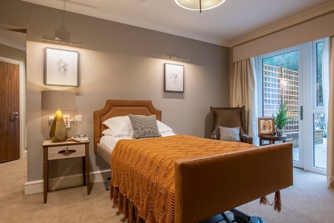 Spacious en-suite bedroom at Cofton Park Manor Care Home in Birmingham designed to support comfort, independence and everyday living