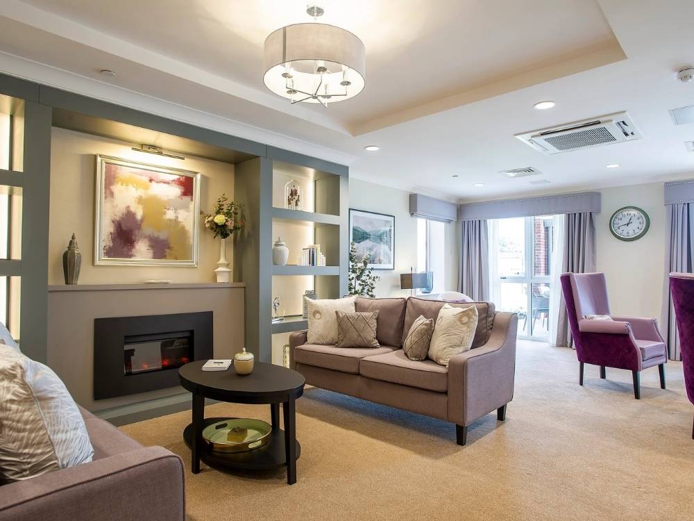 Comfortable lounge at Edwalton Manor Care Home in Nottingham with spacious seating areas, natural light and relaxing communal spaces for residents and families