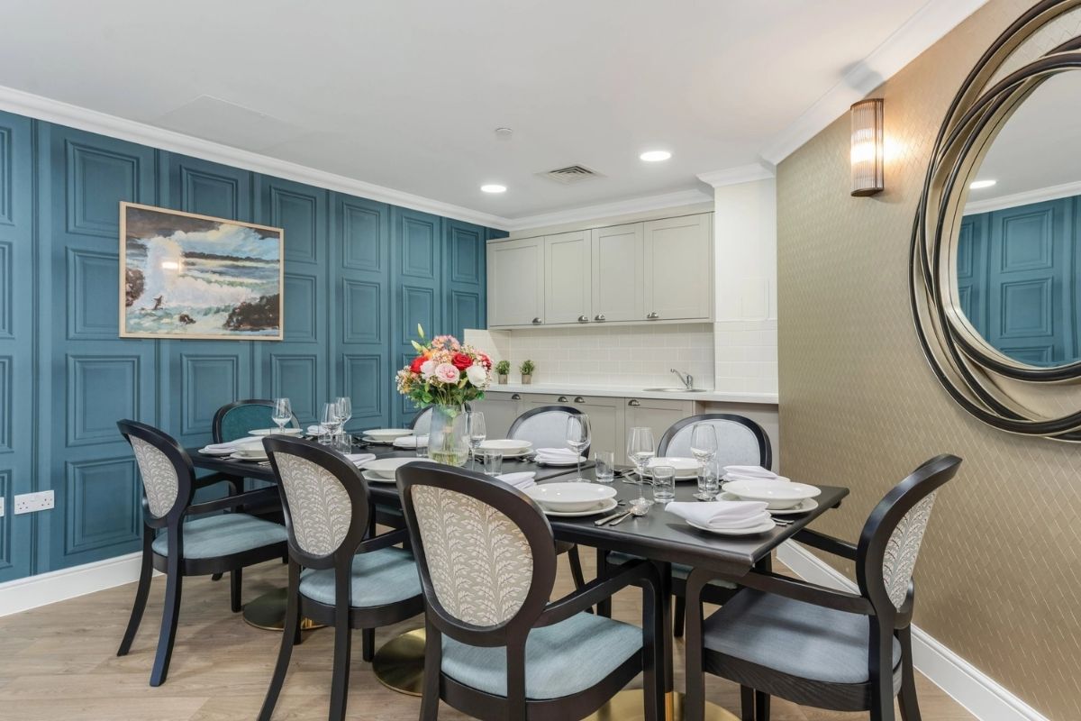 Elegant private dining room at Upton Manor Care Home in Poole, set for shared meals and family gatherings.