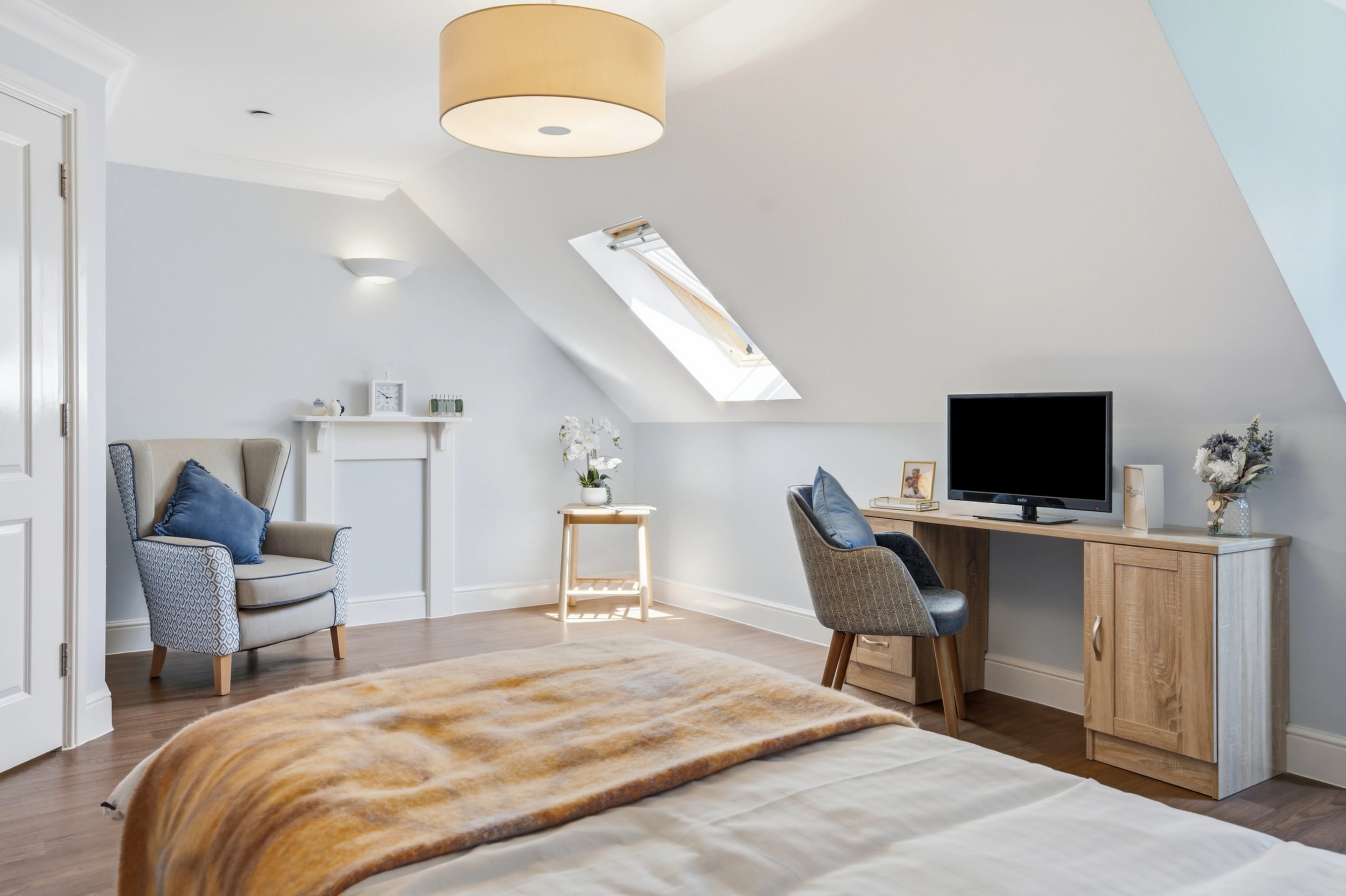 Bright, modern en-suite bedroom at Upton Manor Care Home in Poole, designed for comfort, privacy and everyday living.