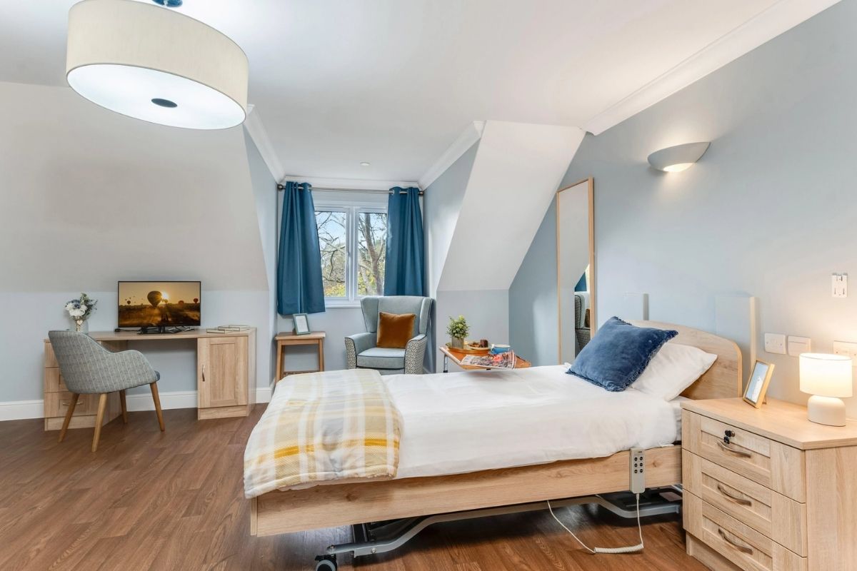 Bright, modern en-suite bedroom at Upton Manor Care Home in Poole, designed for comfort, privacy and everyday living.