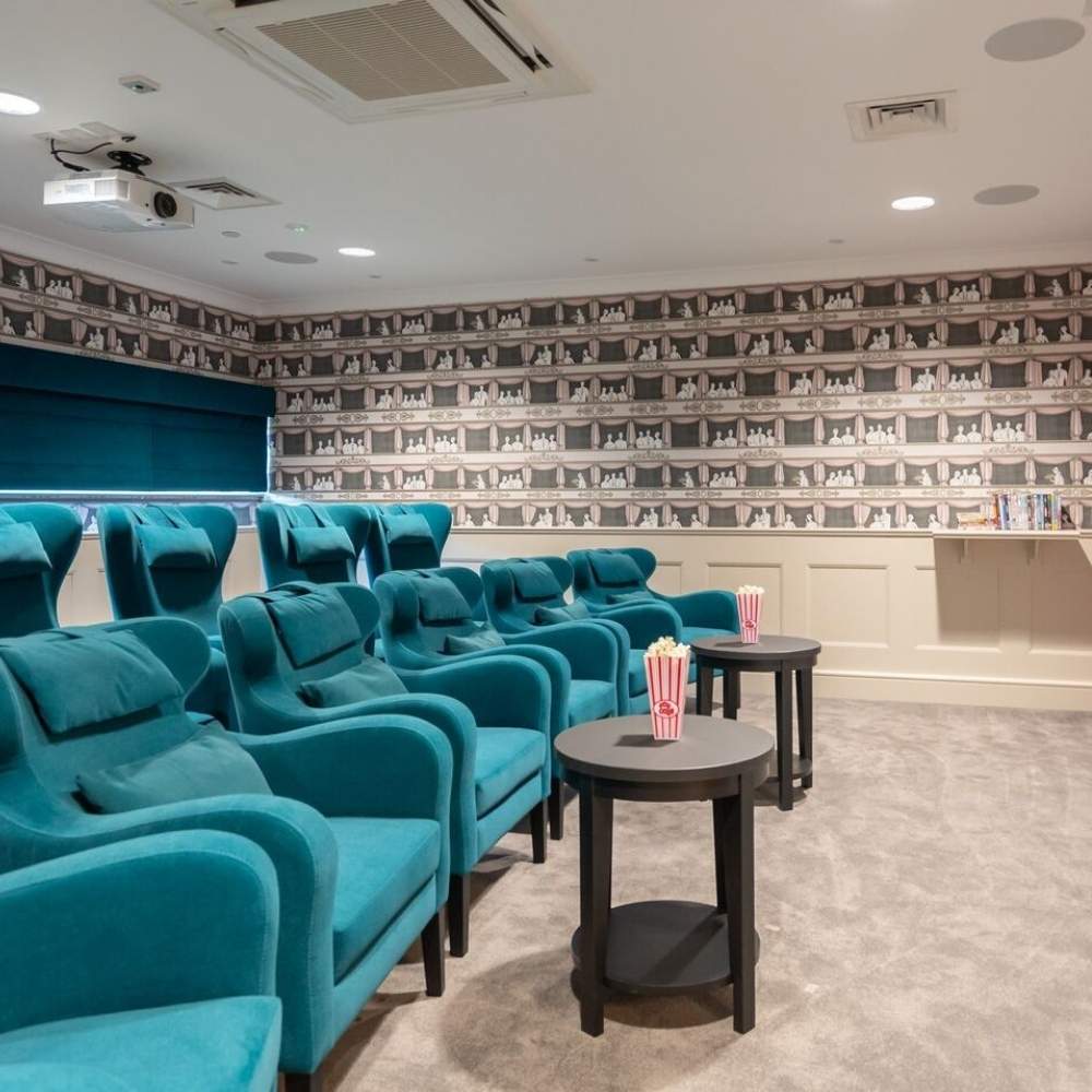 Private cinema room with luxury seating at Templeton Place Care Home