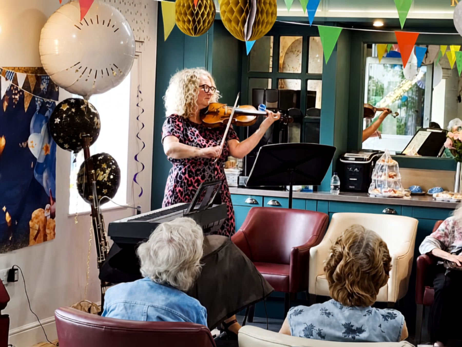 live orchestra group perform for residents