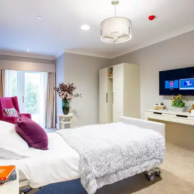 balcony and garden view of Charrington Manor residential care home in West Byfleet