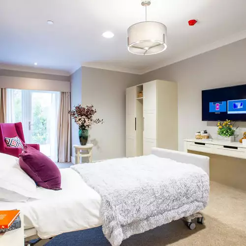 balcony and garden view of Charrington Manor residential care home in West Byfleet