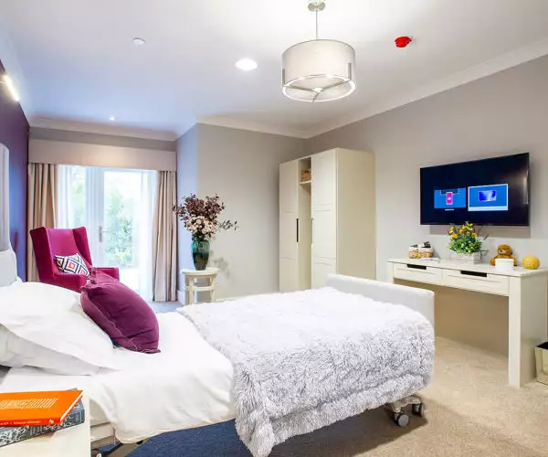 balcony and garden view of Charrington Manor residential care home in West Byfleet