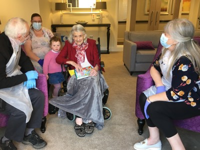 Smiles All Round as Grandparents Welcome Special Guests