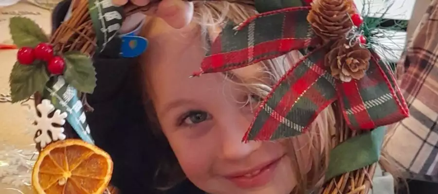 Nursery children join Upton Manor residents for wreath decorating